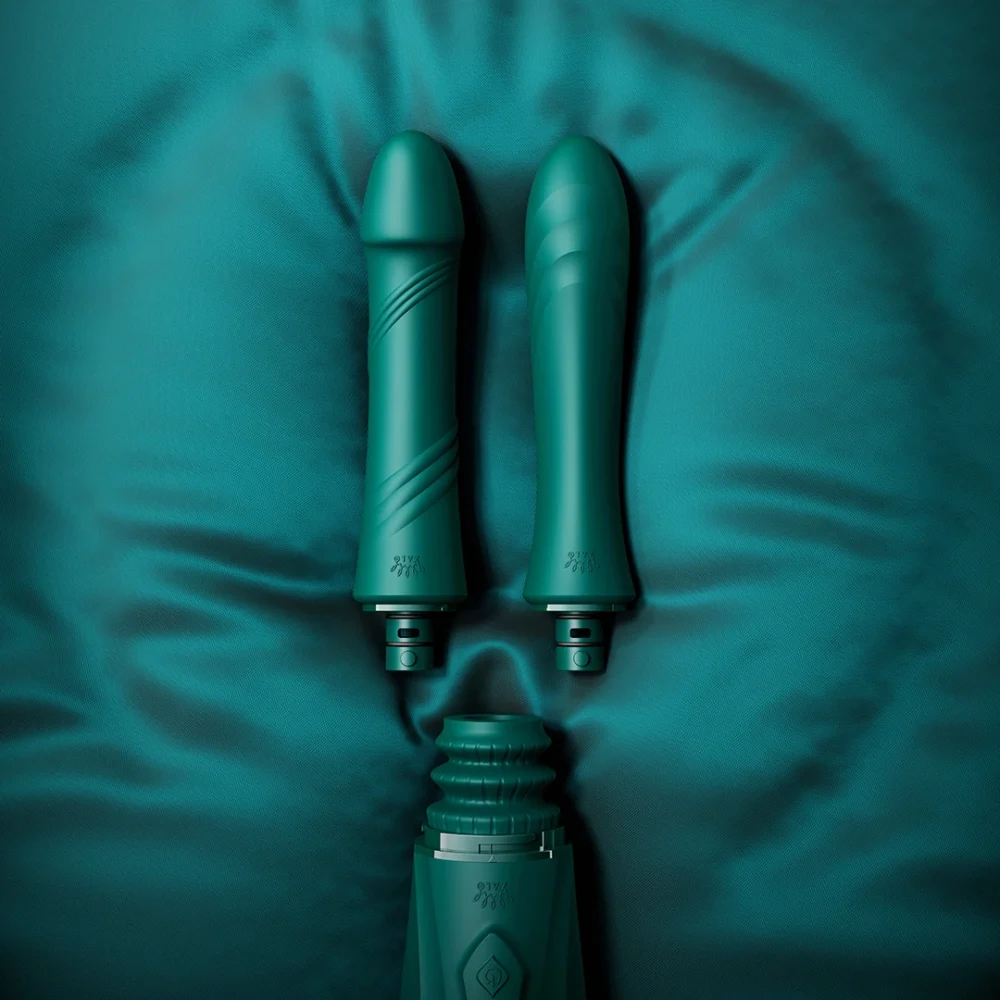 ZALO® Sesh Compact Sex Machine equipped with two replaceable vibrating massage sticks in Turqoise Green color.